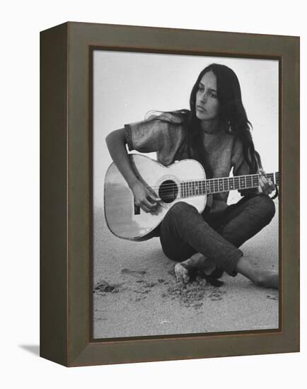 Folk Singer Joan Baez Strumming Her Guitar on the Beach Near Her Home-Ralph Crane-Framed Premier Image Canvas