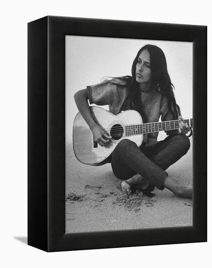 Folk Singer Joan Baez Strumming Her Guitar on the Beach Near Her Home-Ralph Crane-Framed Premier Image Canvas