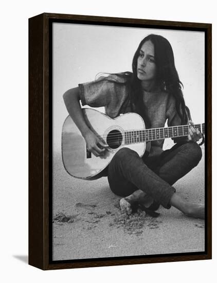 Folk Singer Joan Baez Strumming Her Guitar on the Beach Near Her Home-Ralph Crane-Framed Premier Image Canvas