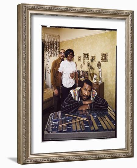 Folk Singer Richie Havens Leaning on Xylophone with Parents: Richard and Mildred in Background-John Olson-Framed Photographic Print