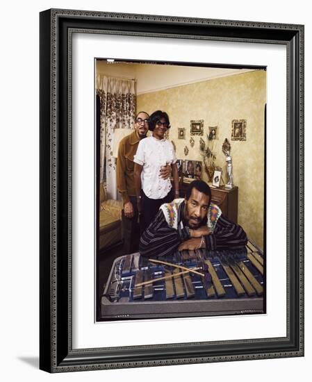 Folk Singer Richie Havens Leaning on Xylophone with Parents: Richard and Mildred in Background-John Olson-Framed Photographic Print
