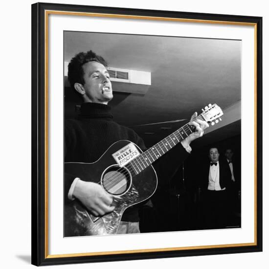 Folk Singer Woody Guthie Performing with Guitar Emblazoned with "This Machine Kills Fascists"-Eric Schaal-Framed Premium Photographic Print