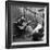 Folk Singer Woody Guthrie Palying His Guitar While Getting a Shoeshine-null-Framed Premium Photographic Print