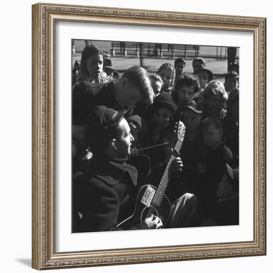 Folk Singer Woody Guthrie Playing Guitar for Group of Children-Eric Schaal-Framed Premium Photographic Print