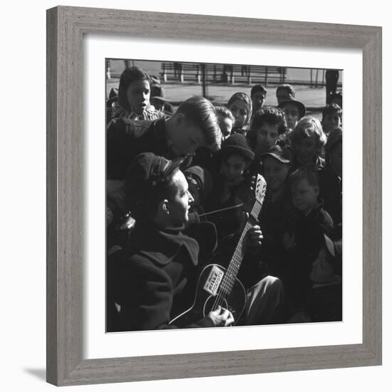 Folk Singer Woody Guthrie Playing Guitar for Group of Children-Eric Schaal-Framed Premium Photographic Print