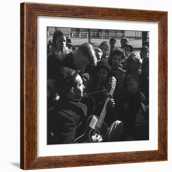 Folk Singer Woody Guthrie Playing Guitar for Group of Children-Eric Schaal-Framed Premium Photographic Print