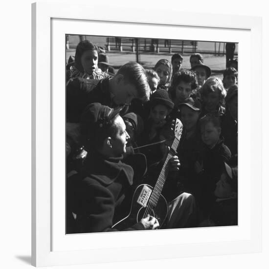 Folk Singer Woody Guthrie Playing Guitar for Group of Children-Eric Schaal-Framed Premium Photographic Print