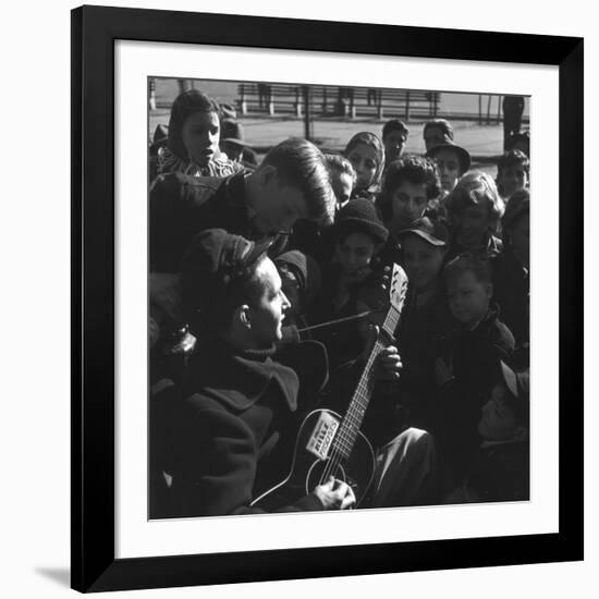 Folk Singer Woody Guthrie Playing Guitar for Group of Children-Eric Schaal-Framed Premium Photographic Print