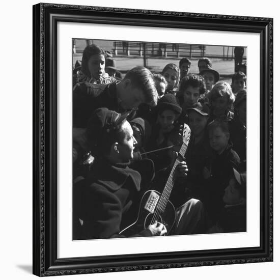 Folk Singer Woody Guthrie Playing Guitar for Group of Children-Eric Schaal-Framed Premium Photographic Print