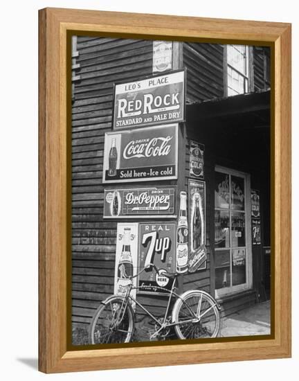 Food Store Called Leo's Place Covered with Beverage Ads Incl. Coca Cola, 7 Up, Dr. Pepper and Pepsi-Alfred Eisenstaedt-Framed Premier Image Canvas