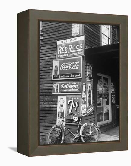 Food Store Called Leo's Place Covered with Beverage Ads Incl. Coca Cola, 7 Up, Dr. Pepper and Pepsi-Alfred Eisenstaedt-Framed Premier Image Canvas