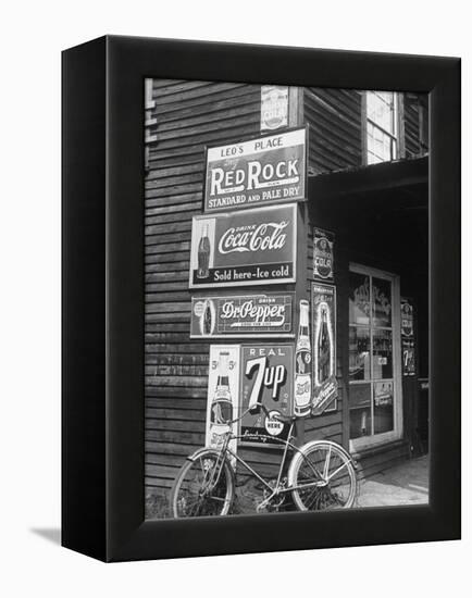 Food Store Called Leo's Place Covered with Beverage Ads Incl. Coca Cola, 7 Up, Dr. Pepper and Pepsi-Alfred Eisenstaedt-Framed Premier Image Canvas