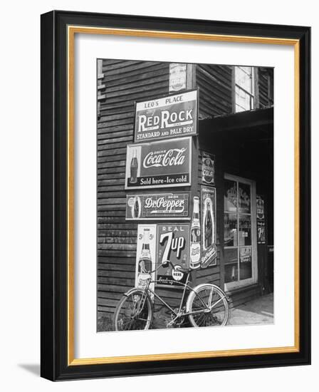 Food Store Called Leo's Place Covered with Beverage Ads Incl. Coca Cola, 7 Up, Dr. Pepper and Pepsi-Alfred Eisenstaedt-Framed Photographic Print