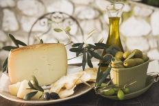 Olives, Cheese, Crackers and Olive Oil on Table Out of Doors-Foodcollection-Photographic Print