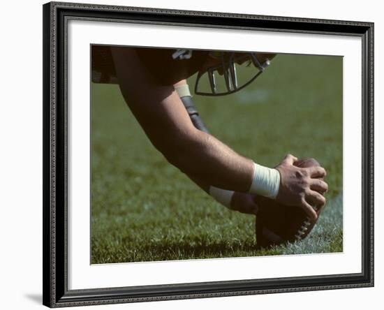 Football Center About to Snap the Ball-Paul Sutton-Framed Photographic Print