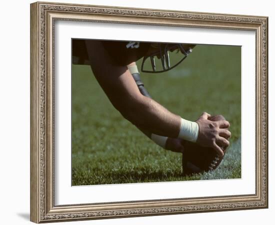 Football Center About to Snap the Ball-Paul Sutton-Framed Photographic Print