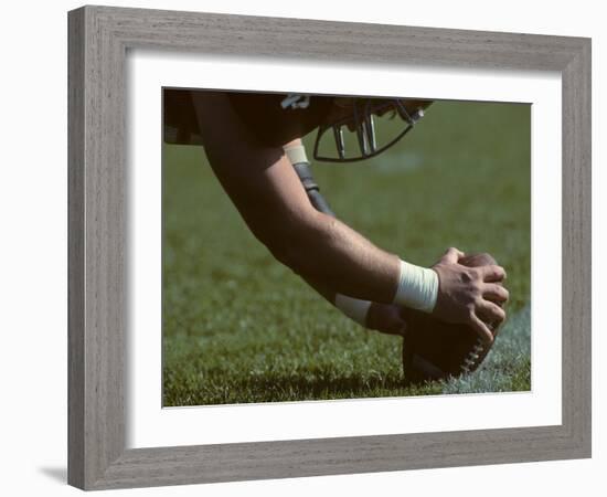 Football Center About to Snap the Ball-Paul Sutton-Framed Photographic Print