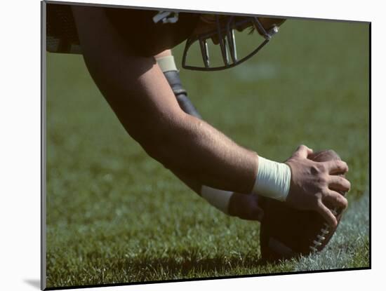 Football Center About to Snap the Ball-Paul Sutton-Mounted Photographic Print