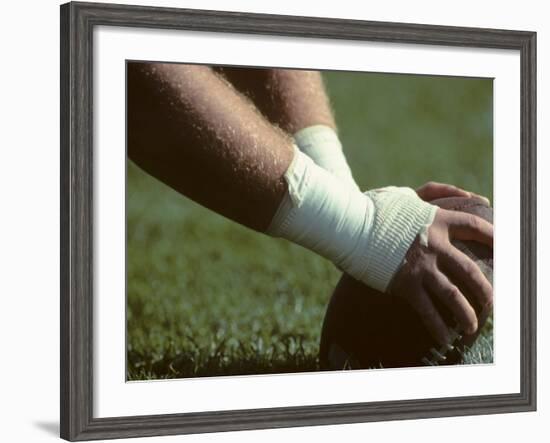 Football Center About to Snap the Ball-Paul Sutton-Framed Photographic Print