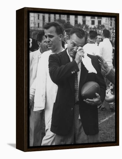 Football Coach Jack Freeman Holding Ball Weeps with Joy After His Team-Hank Walker-Framed Premier Image Canvas
