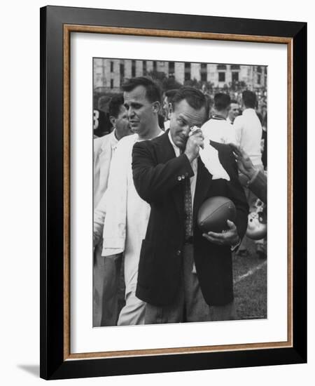 Football Coach Jack Freeman Holding Ball Weeps with Joy After His Team-Hank Walker-Framed Photographic Print