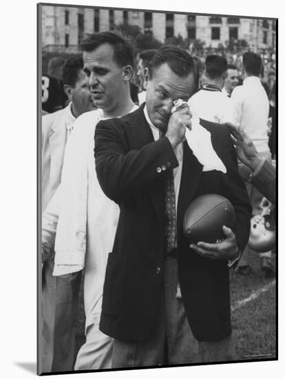 Football Coach Jack Freeman Holding Ball Weeps with Joy After His Team-Hank Walker-Mounted Photographic Print