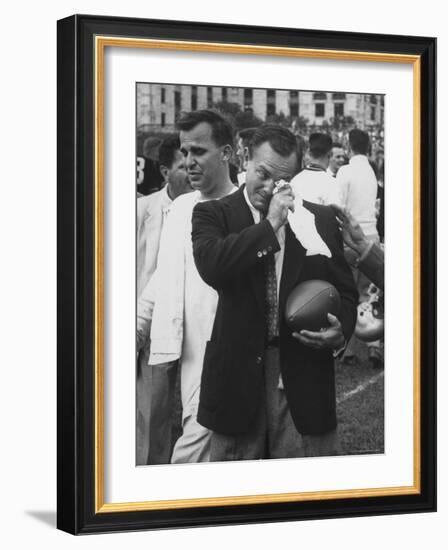 Football Coach Jack Freeman Holding Ball Weeps with Joy After His Team-Hank Walker-Framed Photographic Print