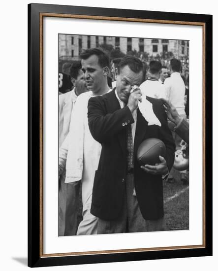 Football Coach Jack Freeman Holding Ball Weeps with Joy After His Team-Hank Walker-Framed Photographic Print