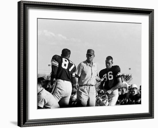 Football Coach Paul Bear Bryant of Texas A&M Talking W. Players During a Game-null-Framed Premium Photographic Print