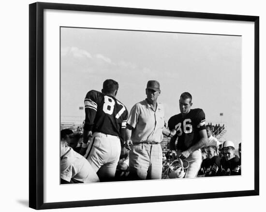 Football Coach Paul Bear Bryant of Texas A&M Talking W. Players During a Game-null-Framed Premium Photographic Print