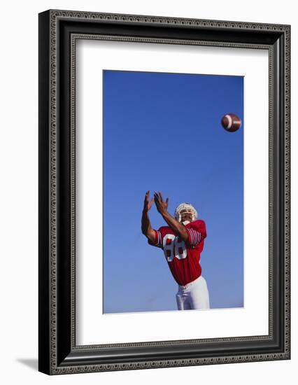 Football Player Catching a Football-DLILLC-Framed Photographic Print