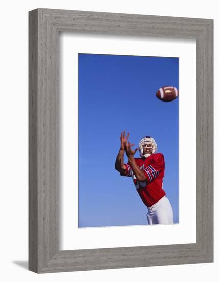 Football Player Catching a Football-DLILLC-Framed Photographic Print