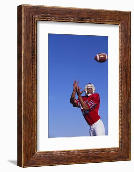 Football Player Catching a Football-DLILLC-Framed Photographic Print