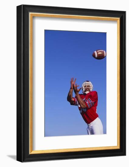 Football Player Catching a Football-DLILLC-Framed Photographic Print