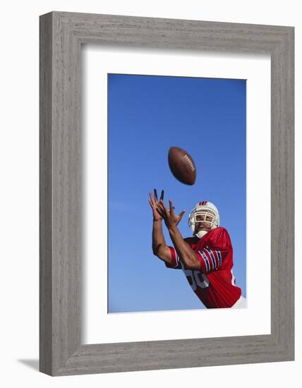 Football Player Catching a Football-DLILLC-Framed Photographic Print