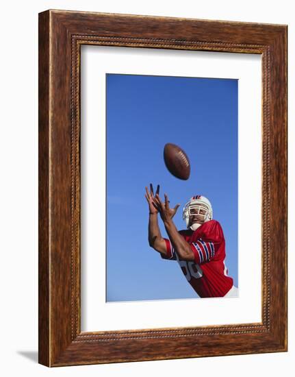 Football Player Catching a Football-DLILLC-Framed Photographic Print