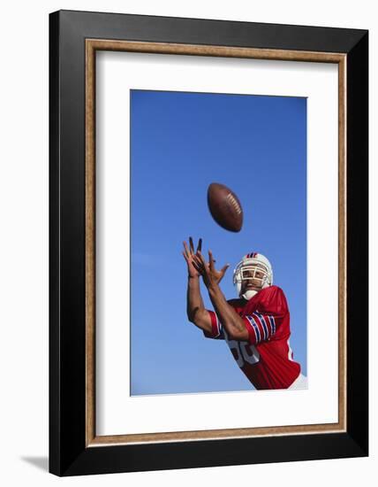 Football Player Catching a Football-DLILLC-Framed Photographic Print