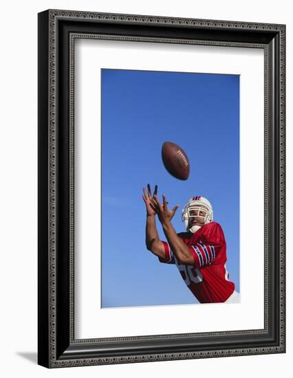 Football Player Catching a Football-DLILLC-Framed Photographic Print