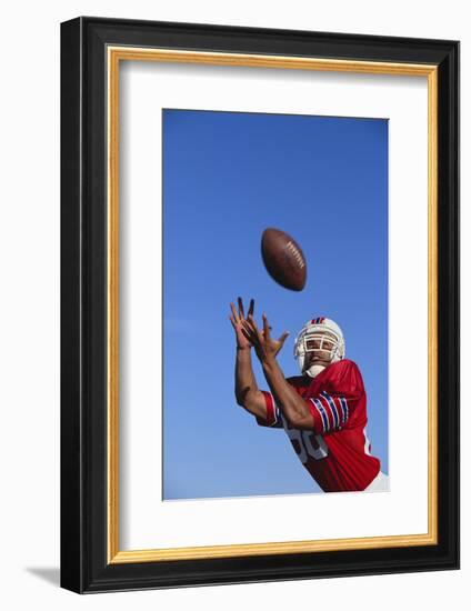 Football Player Catching a Football-DLILLC-Framed Photographic Print