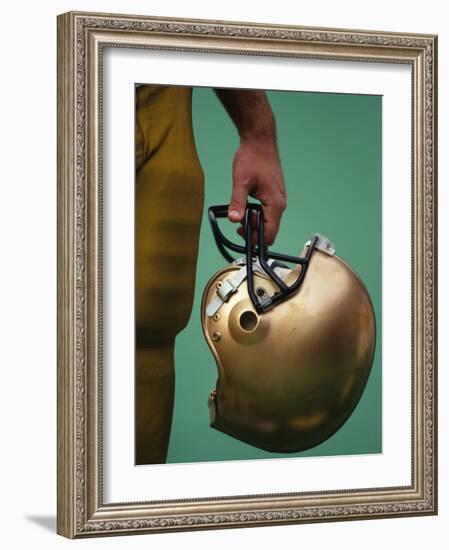 Football Player Holding His Helmet-Chris Trotman-Framed Photographic Print