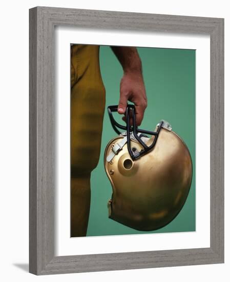 Football Player Holding His Helmet-Chris Trotman-Framed Photographic Print