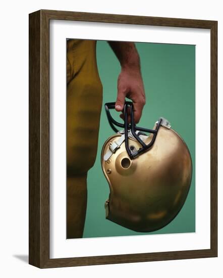 Football Player Holding His Helmet-Chris Trotman-Framed Photographic Print