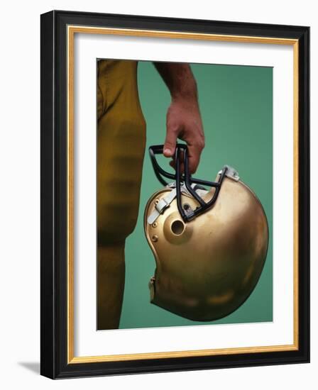 Football Player Holding His Helmet-Chris Trotman-Framed Photographic Print