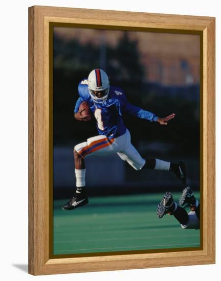 Football Player in Action-null-Framed Premier Image Canvas