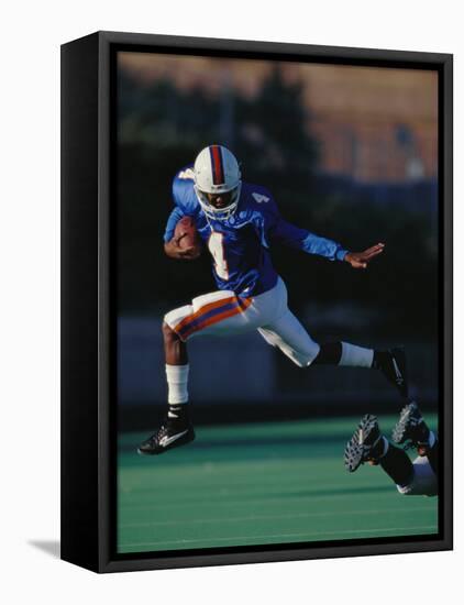 Football Player in Action-null-Framed Premier Image Canvas