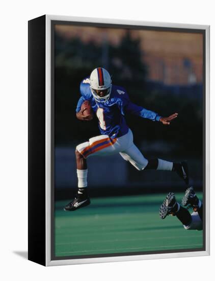 Football Player in Action-null-Framed Premier Image Canvas