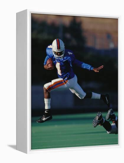 Football Player in Action-null-Framed Premier Image Canvas