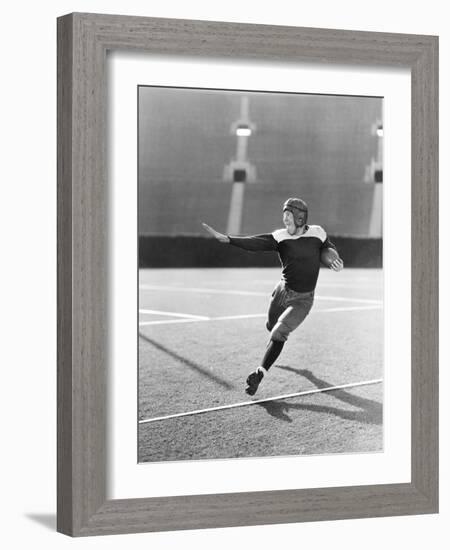 Football Player Running with Ball-null-Framed Photo