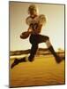 Football Player Running with The Ball-null-Mounted Photographic Print