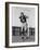 Football Player Throwing Ball-null-Framed Photo